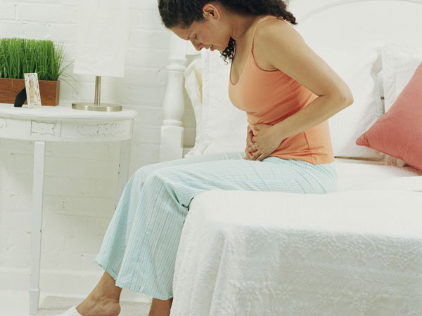 Cảnh giác triệu chứng đau bụng dưới khi mang thai tháng đầu